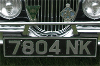 Identify the letters and numbers in this image