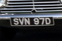 Identify the letters and numbers in this image