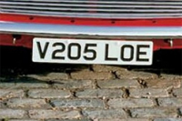 Identify the letters and numbers in this image