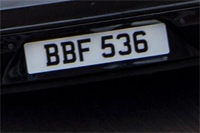 Identify the letters and numbers in this image