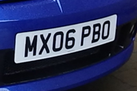 Identify the letters and numbers in this image