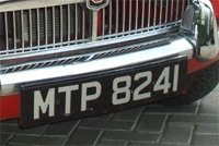 Identify the letters and numbers in this image