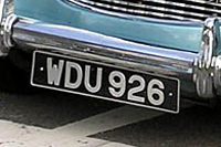 Identify the letters and numbers in this image