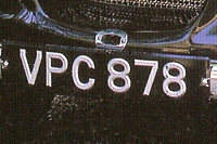 Identify the letters and numbers in this image