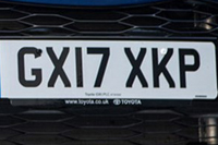 Identify the letters and numbers in this image