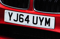 Identify the letters and numbers in this image
