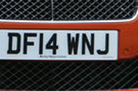 Identify the letters and numbers in this image