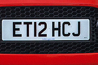 Identify the letters and numbers in this image