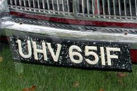 Identify the letters and numbers in this image