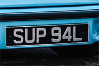 Identify the letters and numbers in this image